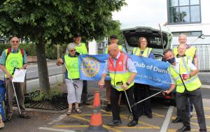 Rotary Club of Dunmow members assembling with staff from Dunmow Tesco for litter picking around Dunmow.